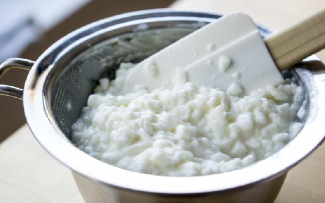 What is cottage cheese made of and what are its properties
